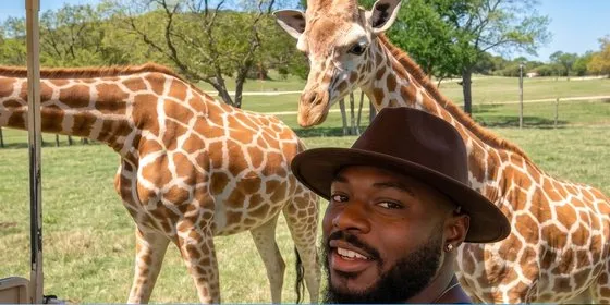 Coach Seven with a giraffe
